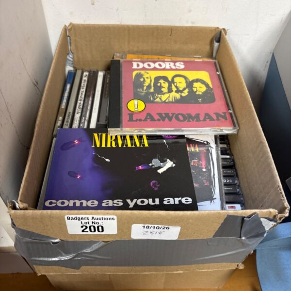 Vinyl record collection featuring Roxy Music, Pink Floyd, and Nirvana albums.