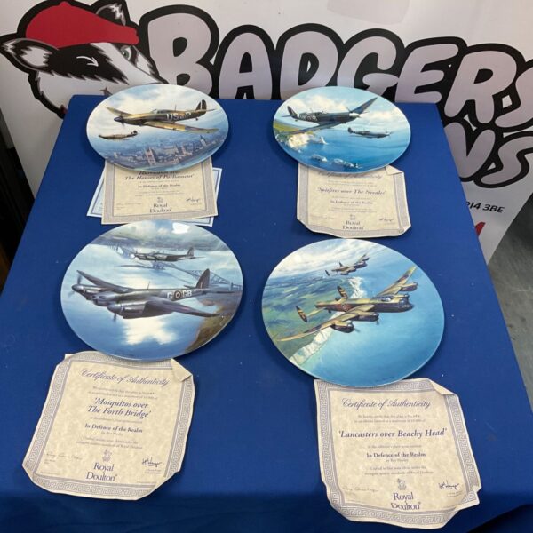 Royal Doulton Defence of the Realm plates with certificates of authenticity.