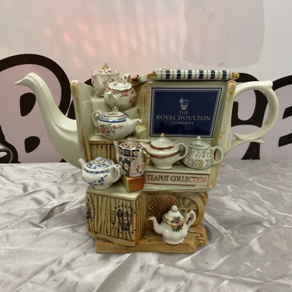 Royal Doulton market stall teapot with miniature teapots and Teapot Collection plaque