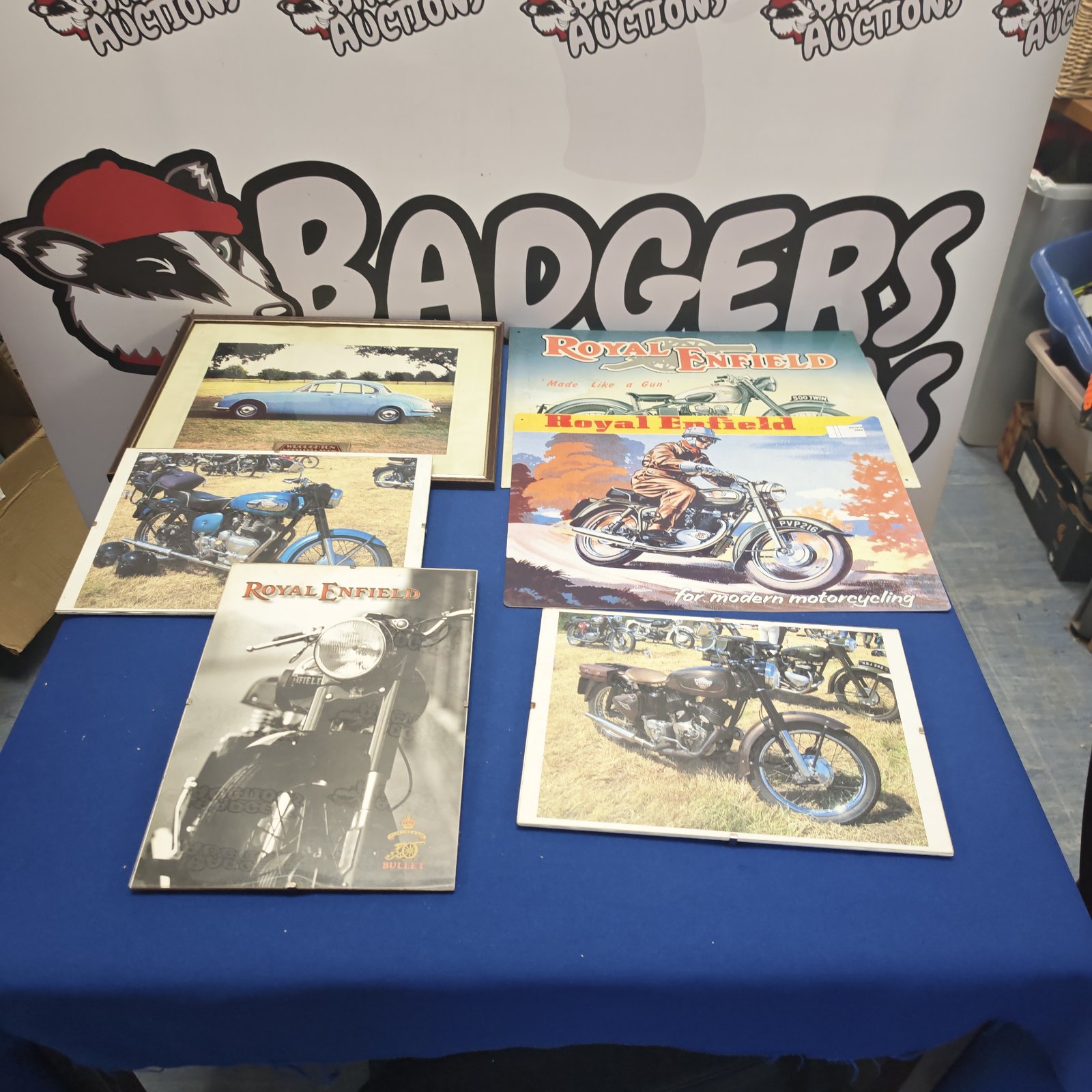 Vintage Royal Enfield advertising signs and photographs for collectors.