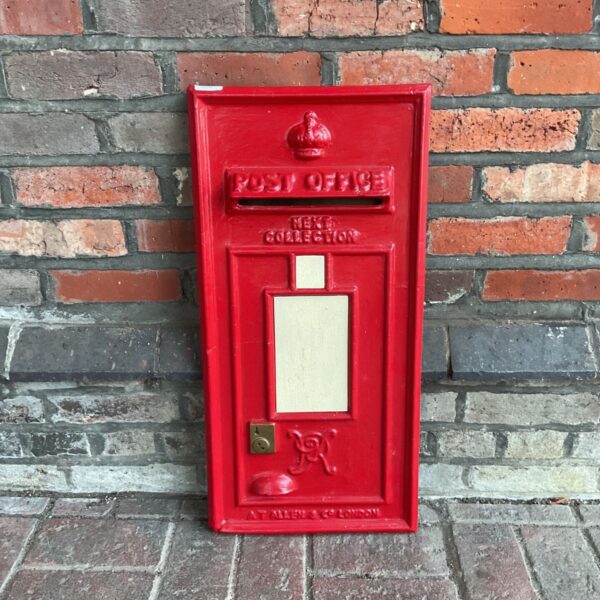Red reproduction Royal Mail post box front for garden decoration.