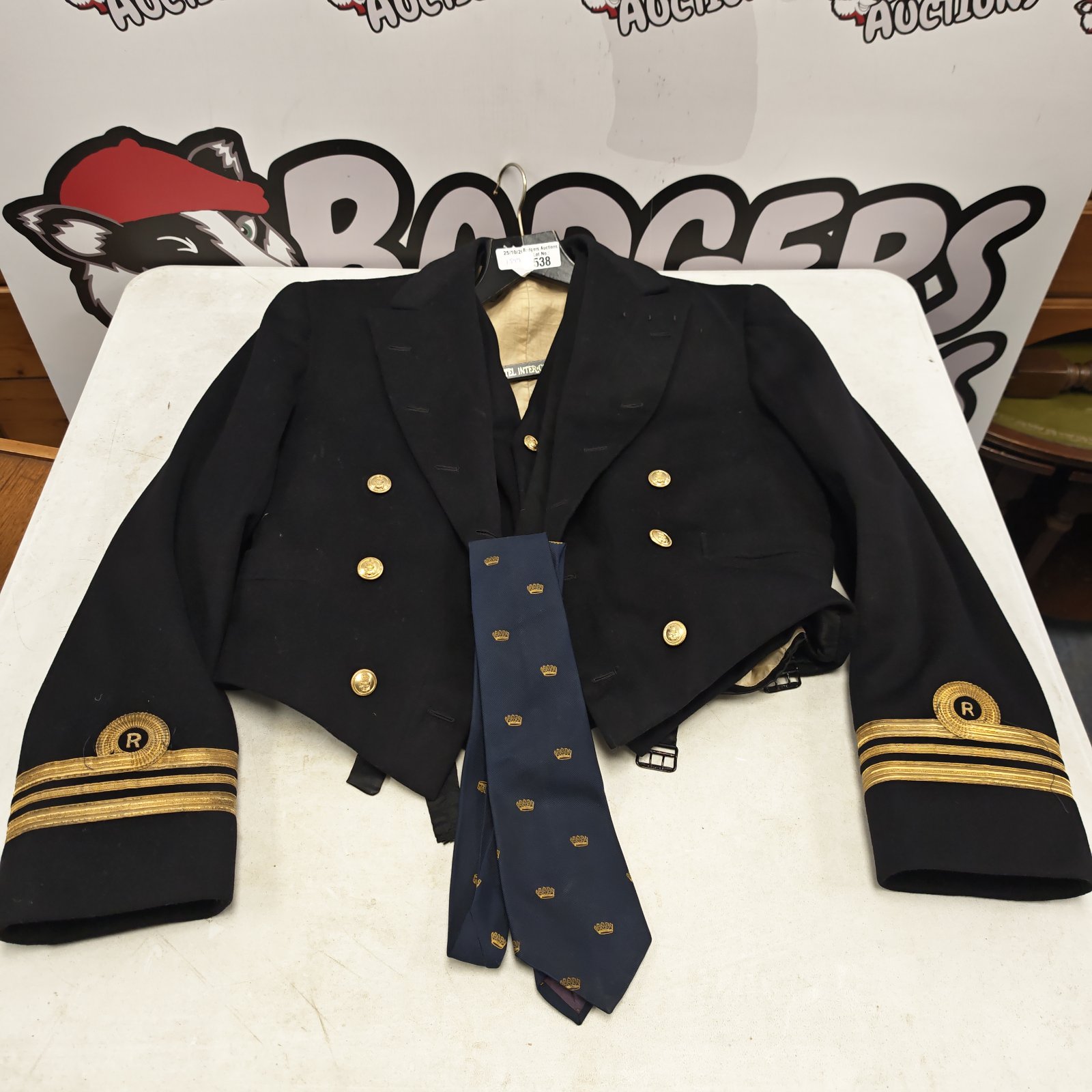 Royal Navy officers jacket with gold braid cuffs, two waistcoats and Chatham tie
