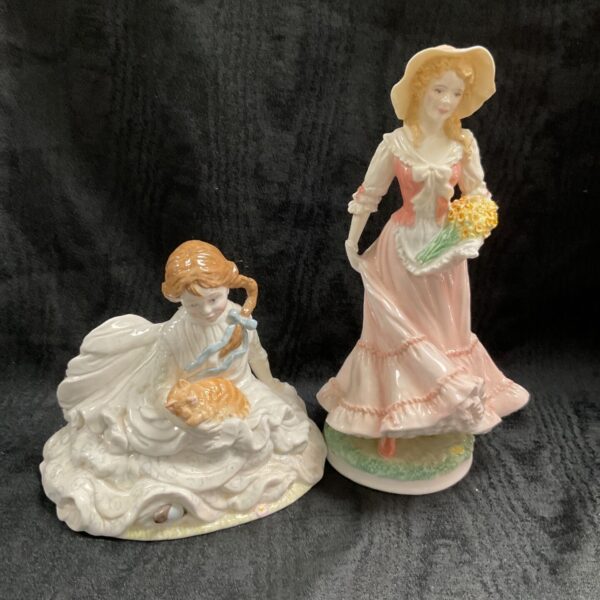 Royal Worcester figurines "Safe at Last" and "Spring" porcelain collectibles.