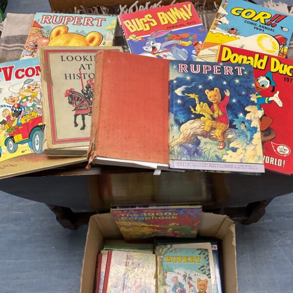 Vintage Rupert the Bear and Bugs Bunny annuals in a box.