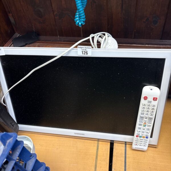 Samsung 22 inch monitor UE22H5610AK with silver frame and white remote