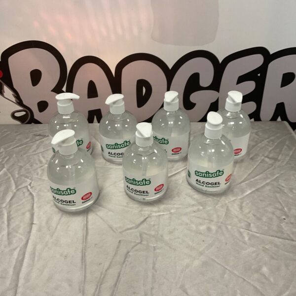 Seven clear 500ml Sanisafe Alcogel hand sanitiser bottles with white pump tops