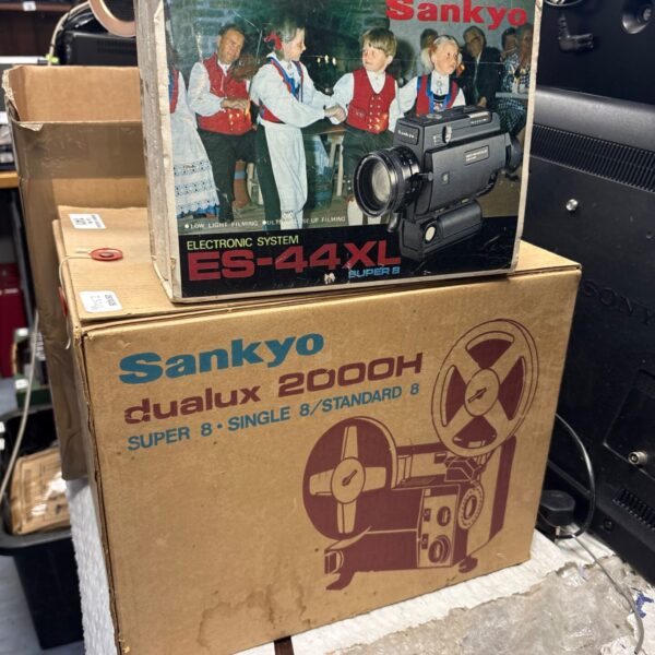 Sankyo ES-44XL Electronic System and Dualux 2000H Super 8 boxes stacked together
