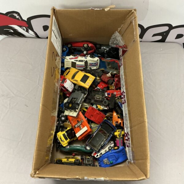 Box of assorted vintage Scalextric electric model racing cars.