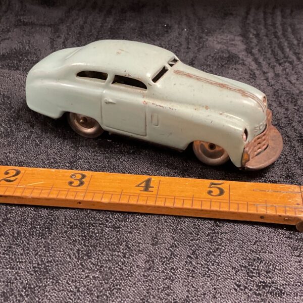Vintage Schuco Mirakocar 1001 tinplate car in mint green, front three-quarter view