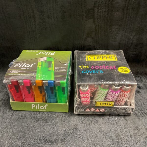 Sealed Pilot and Clipper gas lighter display packs side by side