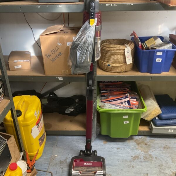 Red and grey Shark cordless stick vacuum with DuoClean floor head