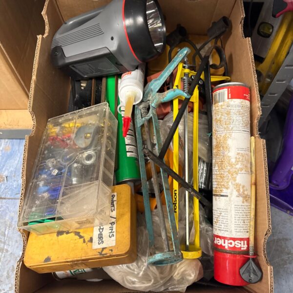 Shed clearance lot with Ryobi drill and assorted tools and hardware.