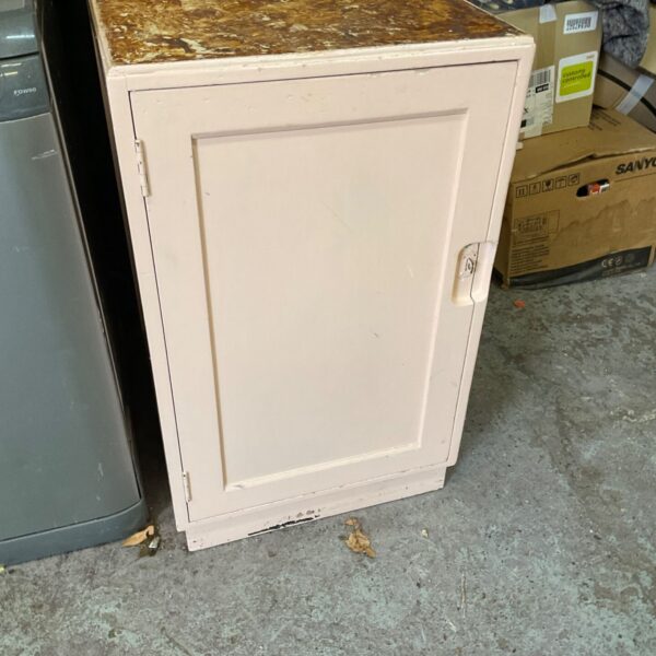 Painted wooden shed storage cupboard for garden tools.