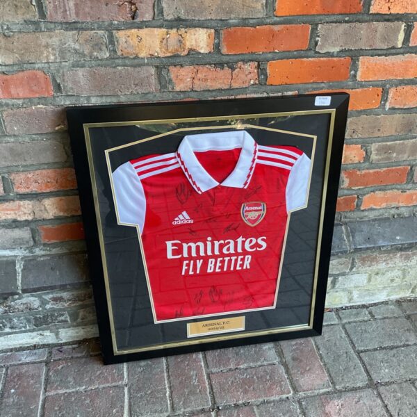 Signed Arsenal 2024-25 season football shirt by Adidas.