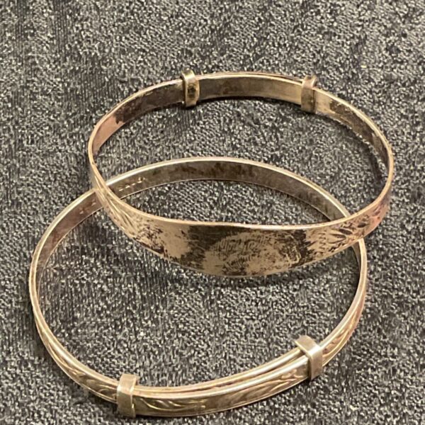 Stack of two vintage silver christening bracelets.