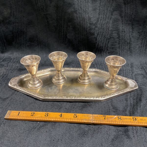 Antique silver Judaica L’Chaim toasting set with four cups on tray.