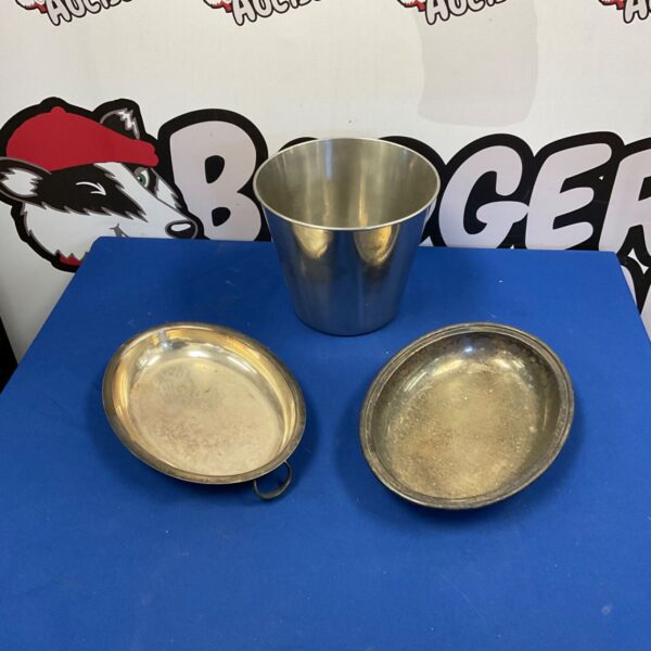 Vintage silverplate ice bucket for serving drinks.