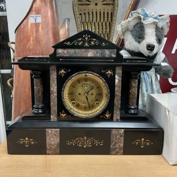 Black slate and marble Ansonia mantel clock with gilt brass dial