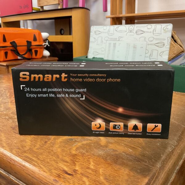 Boxed Smart home video door phone security system in black and orange packaging