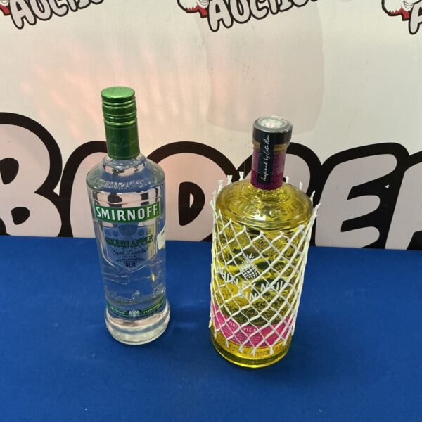 Smirnoff green apple vodka and Whitley Neil pineapple gin bottles.