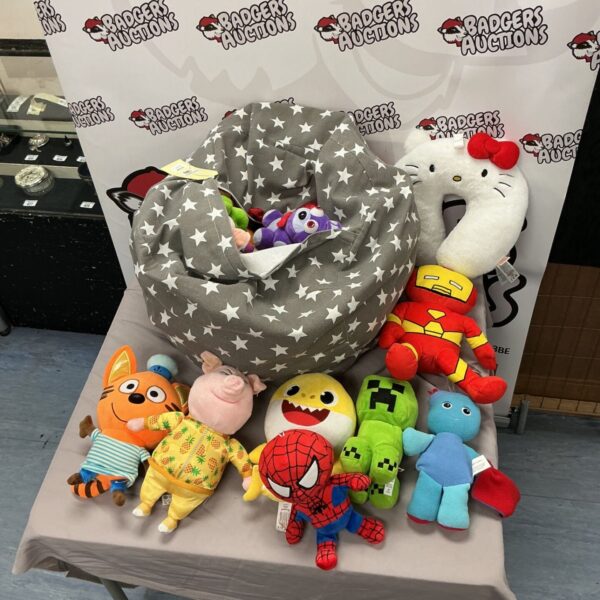 Assorted soft toy bundle with pig, dinosaur, and Spider-Man.