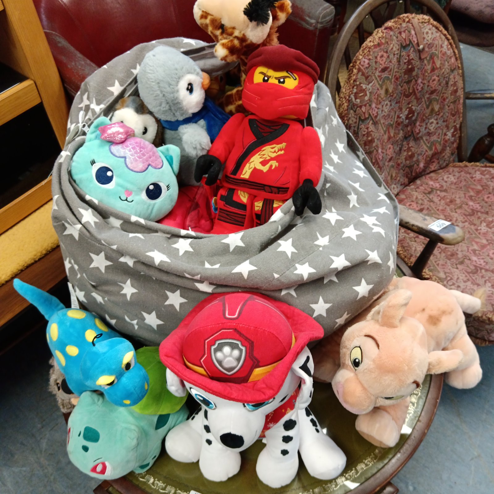 Large soft toy bundle featuring Pokémon, Disney, and Lego plushies.
