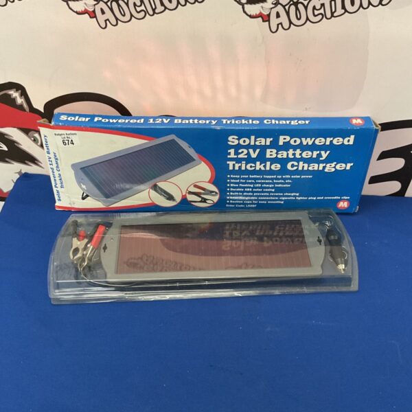 Vintage solar powered 12v battery trickle charger, model 674.