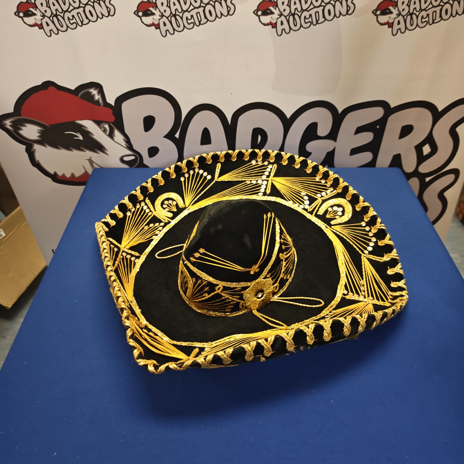 Traditional Mexican sombrero hat with elaborate gold embroidery.