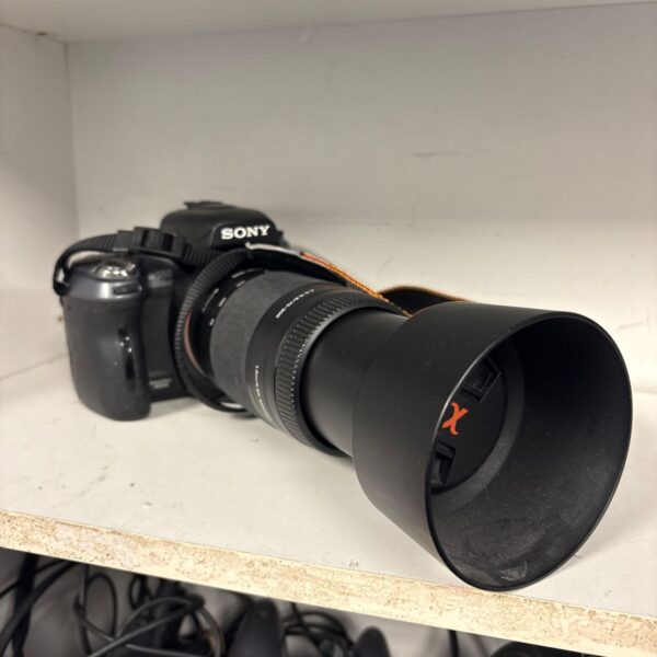 Sony A550 DSLR camera with SH0007 lens and lens hood, front angle