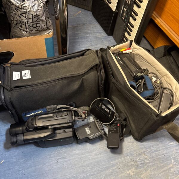 Vintage Sony Handycam Video 8 and Hi8 camcorders in cases.