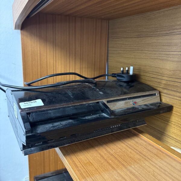 Black Sony PlayStation 3 console for retro gaming.
