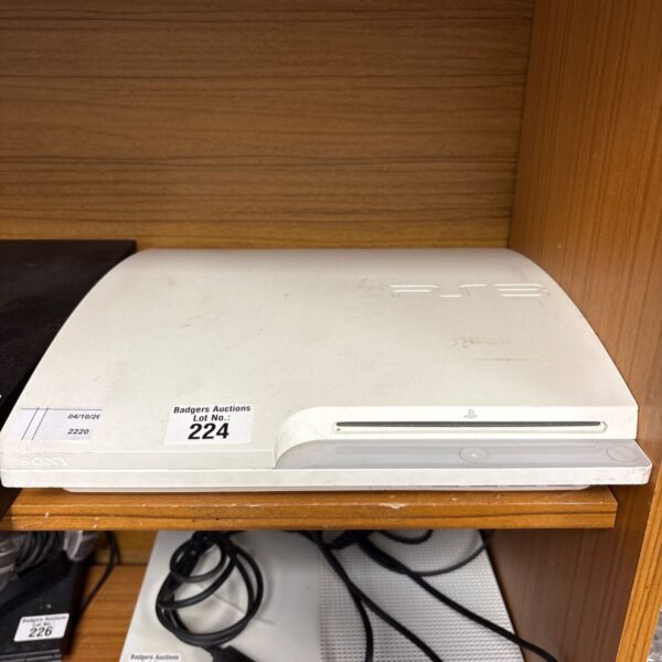 White Sony PlayStation 3 Slim console for gaming.