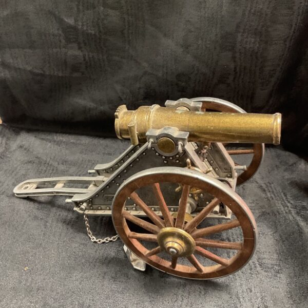 Brass and steel Spanish 19th century model mortar with wooden-spoked wheels