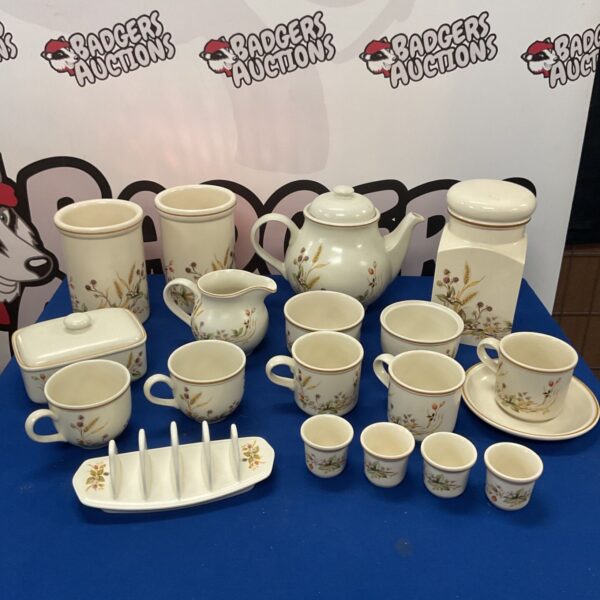 St Michael harvest stoneware collection featuring teapot, jars and cups.