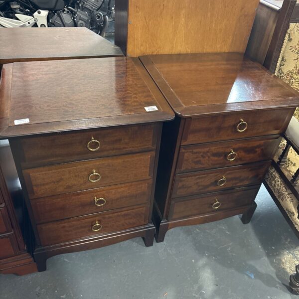 Pair of Stag Minstrel four-drawer bedside chests with brass ring pulls