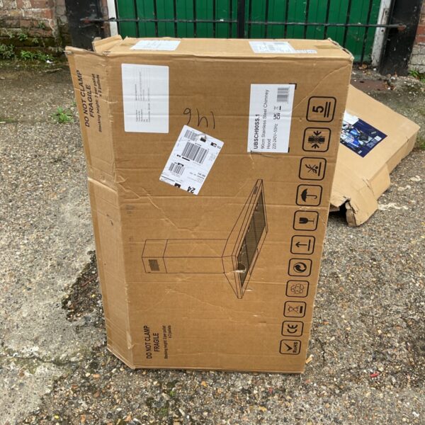 Stainless steel chimney hood in shipping packaging.