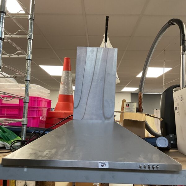 Stainless steel chimney cooker hood for kitchen ventilation.