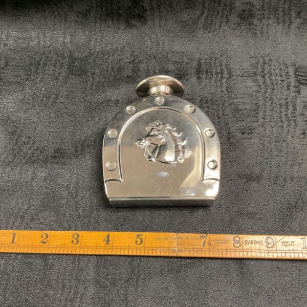 Polished stainless steel horseshoe hip flask with embossed horse head design