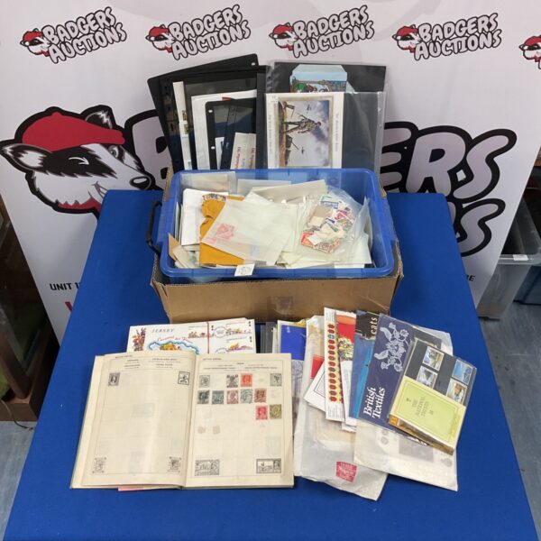 Diverse stamp collection with loose stamps, albums and first day covers.
