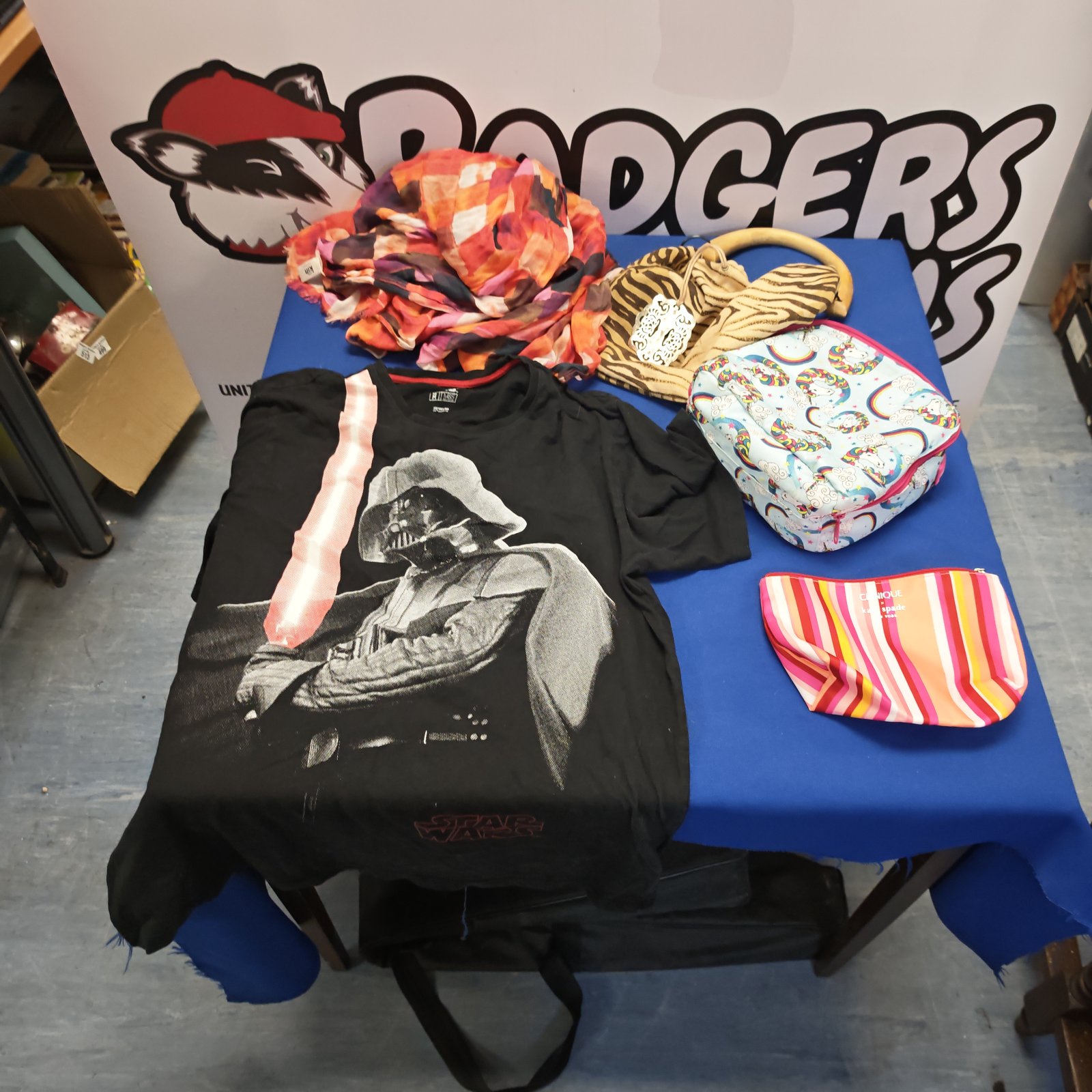 Star Wars t-shirt and Kate Spade handbag bundle for collectors.