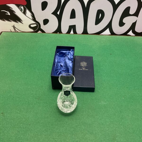 Stuart Crystal posy vase beside its navy presentation box with blue tissue
