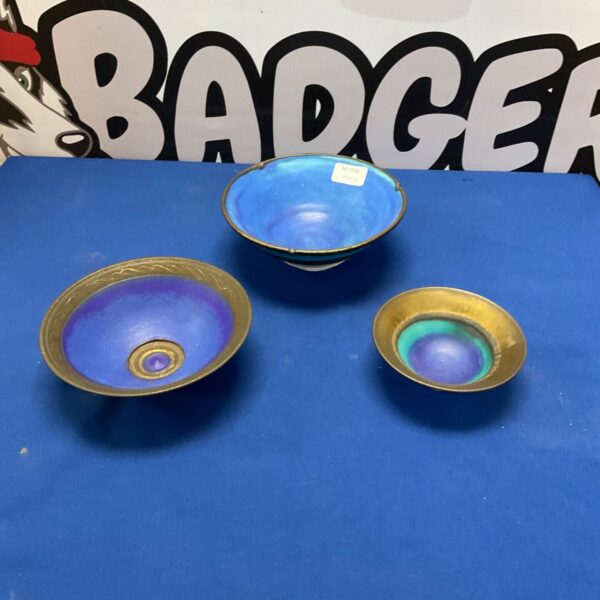 Purple glazed studio pottery bowl, handmade ceramic art.
