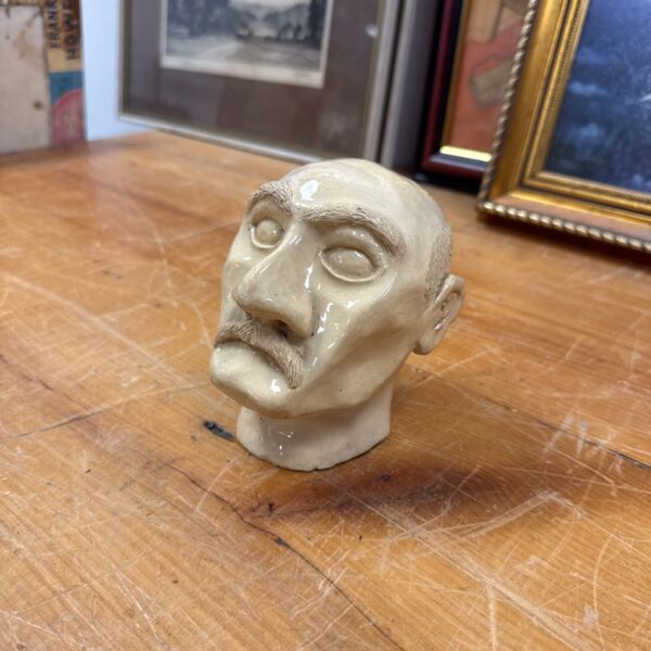 Vintage studio pottery bust of a man with a moustache.