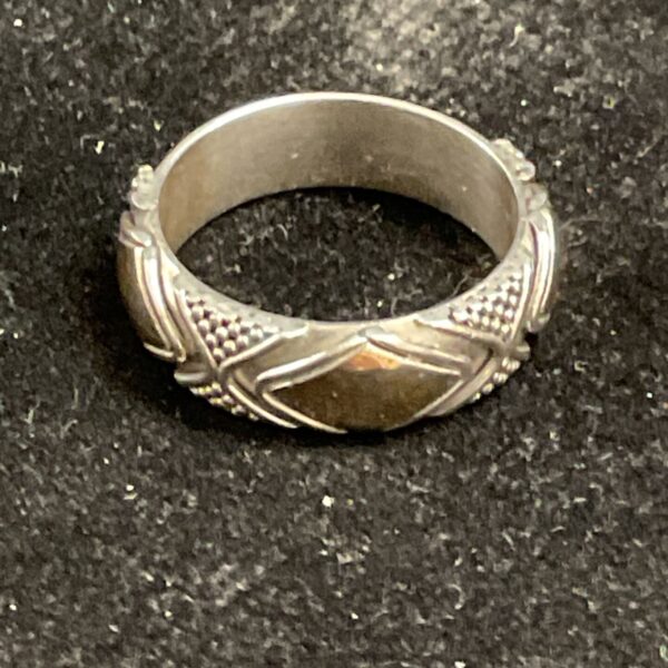 Close-up of the silver Suarti ring with amber stone.