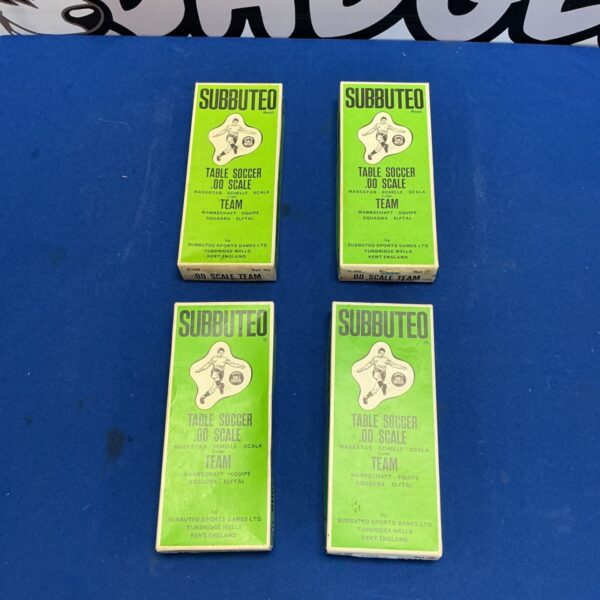 Four boxed Subbuteo Table Soccer .00 Scale Teams in green packaging