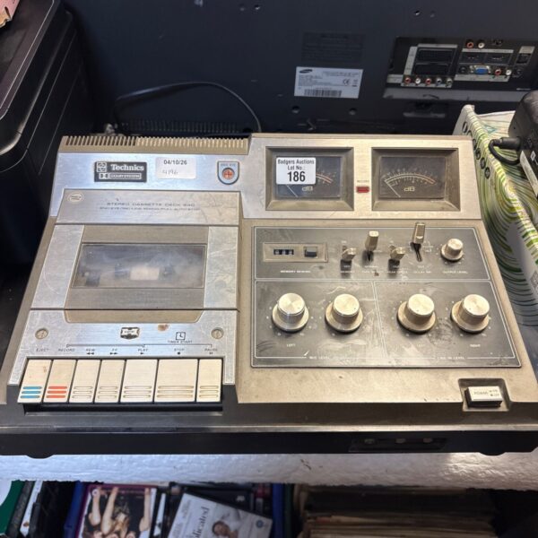 Vintage Technics 640 stereo cassette deck, front view.