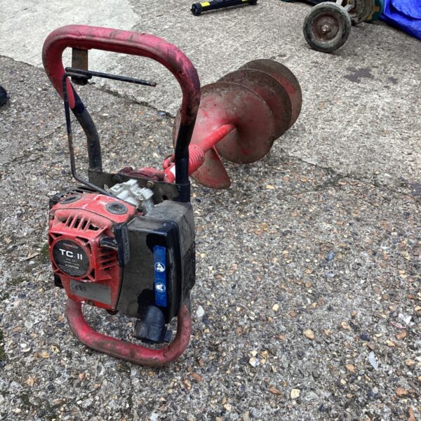 Tecumseh TC II petrol post hole borer, vintage garden tool.