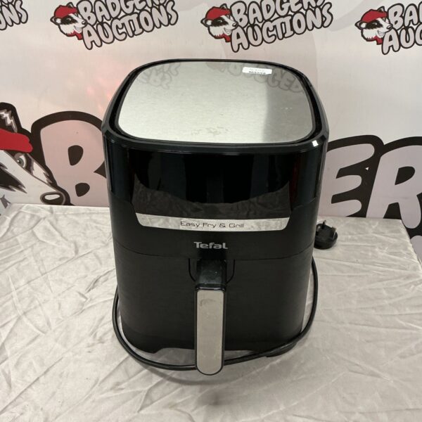 Black Tefal Easy Fry and Grill air fryer with silver-tone top and handle
