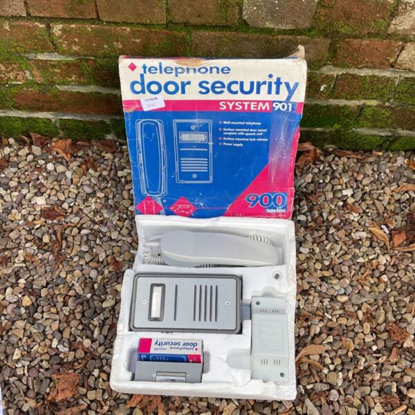 Vintage telephone door security system 900 series for home entry.