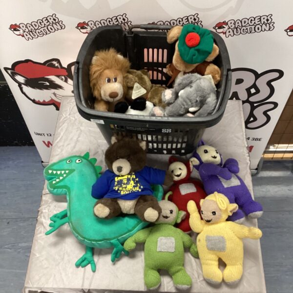 Basket of assorted soft toys including Teletubbies and Benjamin Bunny plush